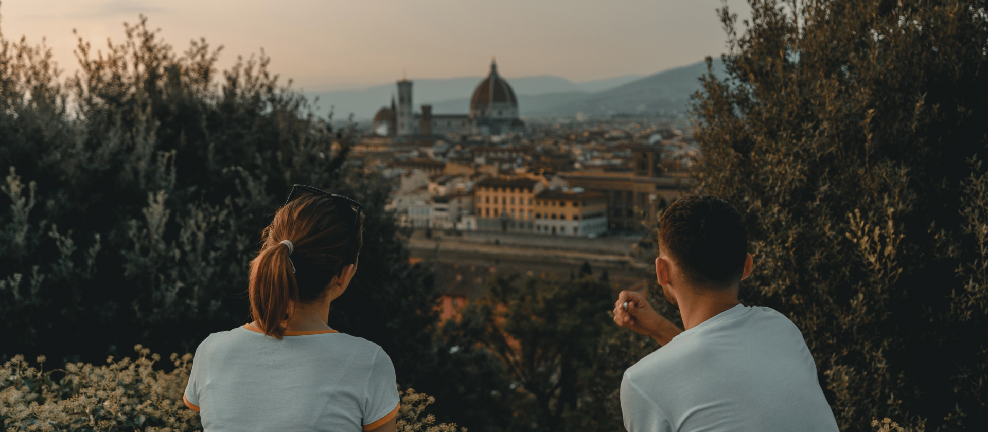 Two people overlooking the city of Florence