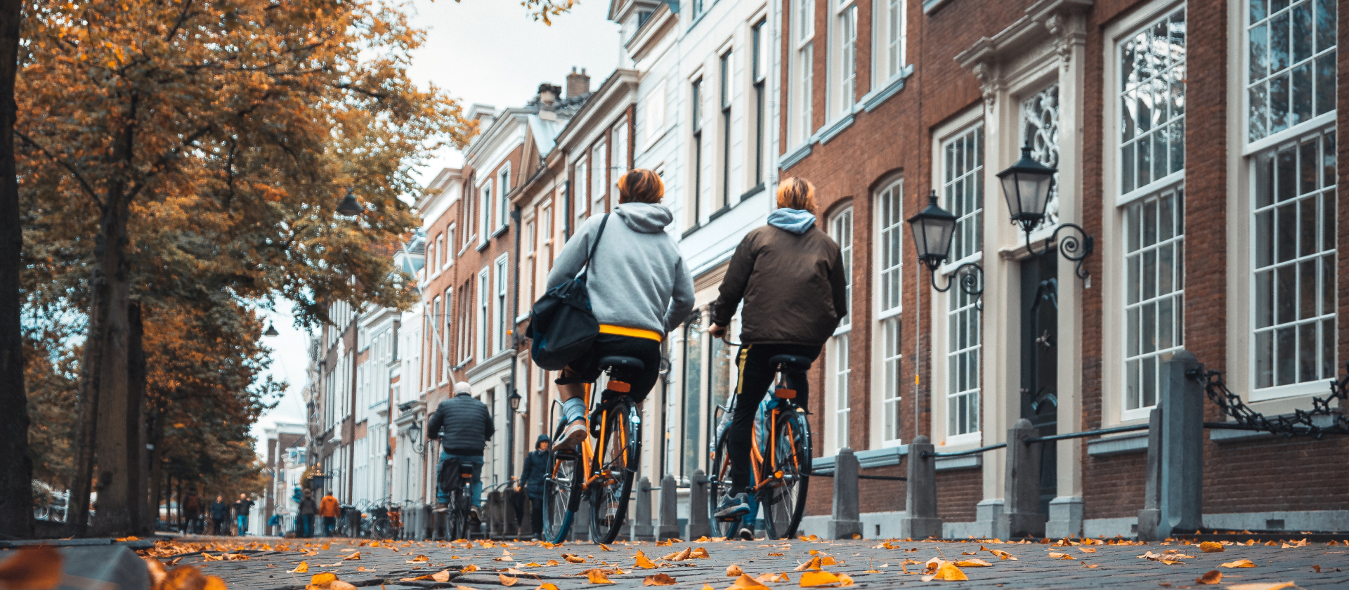 People biking on the streets of Delft