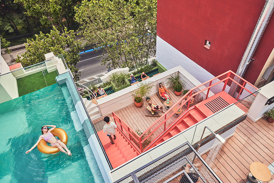 Top view of the rooftop pool and terrace at The Social Hub Madrid
